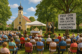 Banner Andacht zu Ehren der Hl. Rita von Cascia im Pfarrgarten