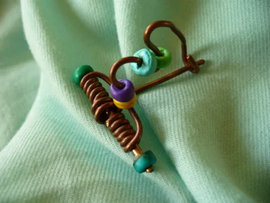 Banner Ferienprogramm "Römische Fibeln gestalten"